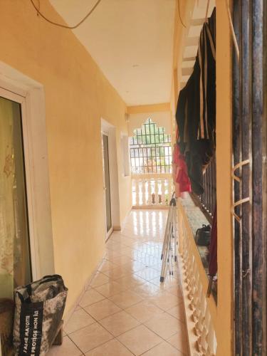 a hallway of a house with a staircase and a room at Mo'Passa Suite in Mamoudzou