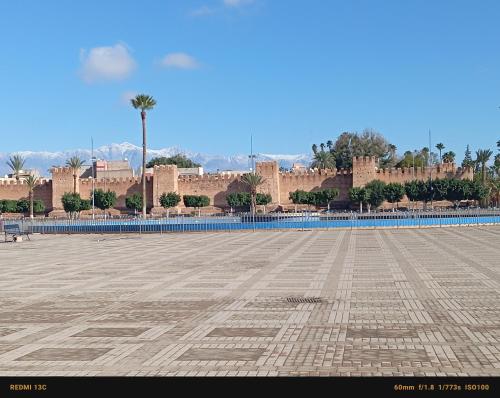 a large empty plaza with a building in the background at Riad Hmam Sofa in Taroudant