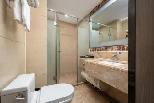 Ένα μπάνιο στο Yilandu Apartment Hotel Guangzhou Tower Pazhou International Exhibition Center Branch