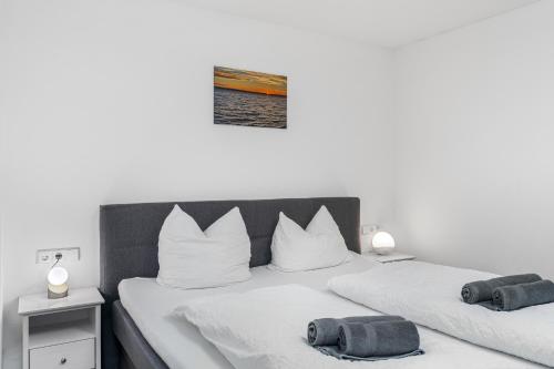 Postel nebo postele na pokoji v ubytování Apartment Bodensee 29 mit Küche und Garten