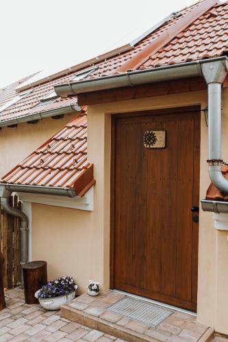 a wooden door of a house with at Apartmány Lešovice in Netschetin