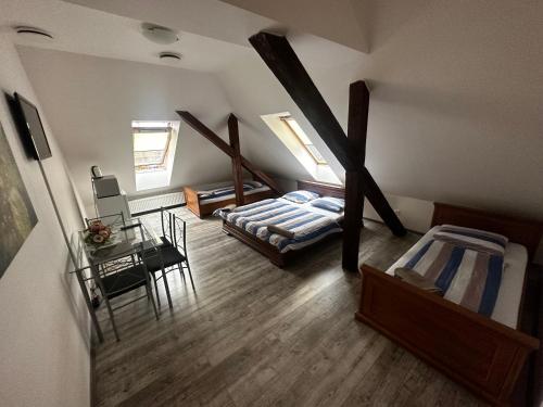 Postel nebo postele na pokoji v ubytování Penzión-Hutira Relax club