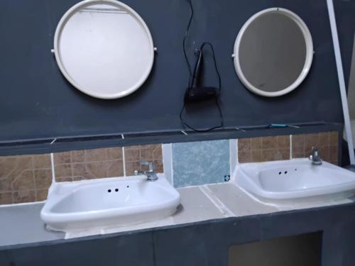 Ванная комната в Hostel 24 Backpackers