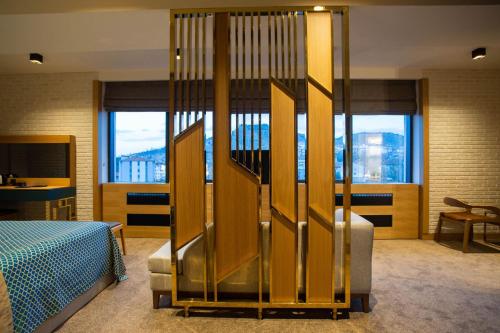 Ένα ή περισσότερα κρεβάτια σε δωμάτιο στο Joyana Otel