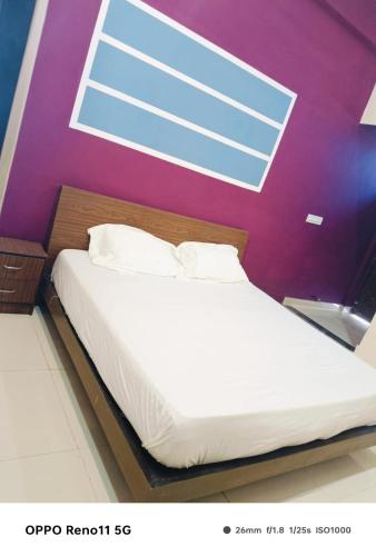 Katil atau katil-katil dalam bilik di Sariska Mount View Hotel