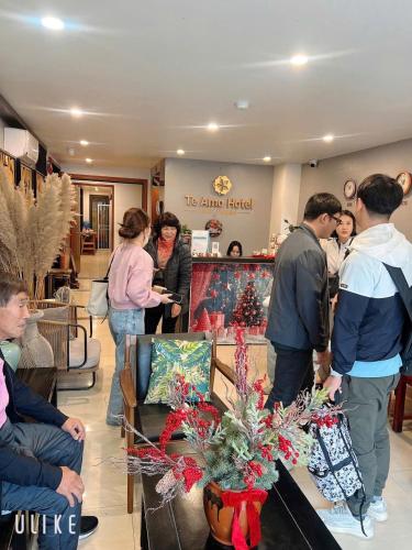 a group of people standing in a store at HOTEL TE AMO in Hai Phong