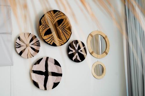 a group of plates hanging on a wall at Hotel Dakhla Club & SPA in Dakhla