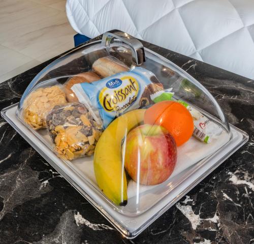 a plastic tray of food on a table at Dun Gorg Guest House in Marsaxlokk