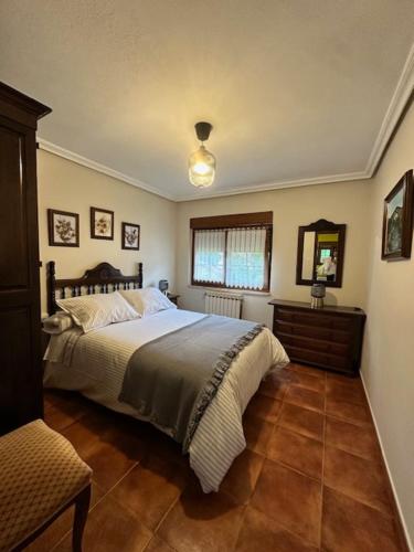 Ένα ή περισσότερα κρεβάτια σε δωμάτιο στο Casa Las Coberazas
