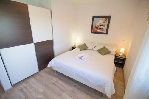 Katil atau katil-katil dalam bilik di Ferienhaus In Opanci Mit Beheiztem Pool, Parkplatz
