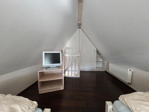 Una cama o camas en una habitación de Taun Hövt