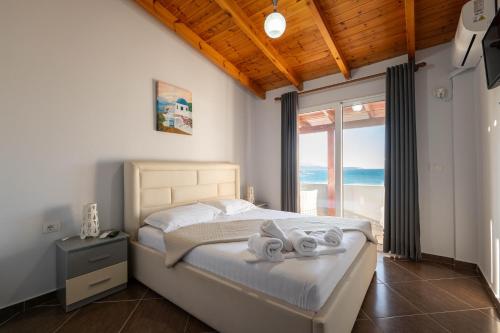 Llit o llits en una habitació de Vila Cerca de Mar