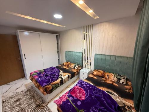 Una cama o camas en una habitación de Gleem Sea View 2