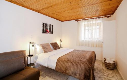 Postel nebo postele na pokoji v ubytování Oiti Mountain Apartments