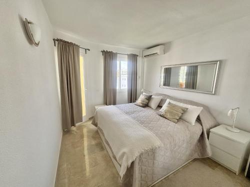 Ένα ή περισσότερα κρεβάτια σε δωμάτιο στο K13 Ocean Point - Apartment