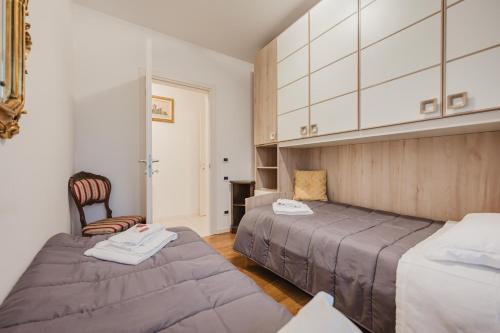 Postel nebo postele na pokoji v ubytování Lucrezia Suite - 10 min from Venice & Free Parking