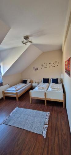 Postel nebo postele na pokoji v ubytování Plavi Dom