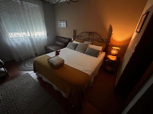 Ένα ή περισσότερα κρεβάτια σε δωμάτιο στο Hostal Casa San Nicolas