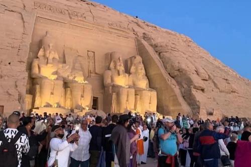 a large crowd of people standing in front of a building at Amon guest house in Abu Simbel