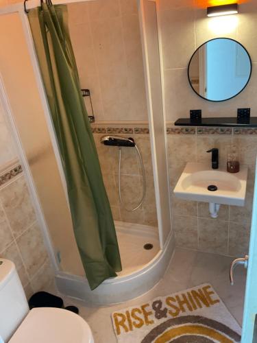 a bathroom with a shower and a sink at Villa Panorama Mijas Pueblo in Mijas