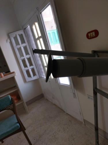 a camera in a room with a door and a window at الكيمان in Fayoum Center