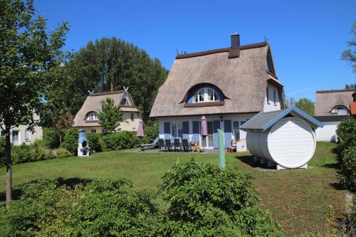 O grădină în afara Ferienhaus Mit Garten, Sauna, Kamin Und Whirlpool