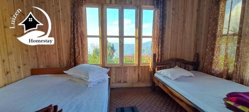 Ένα ή περισσότερα κρεβάτια σε δωμάτιο στο Luizen Homestay Kaffergaon