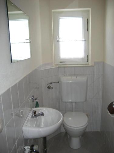 Ванная комната в Ferienhaus Weber