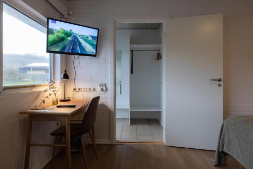 TV a/nebo společenská místnost v ubytování Hotel Lisboa