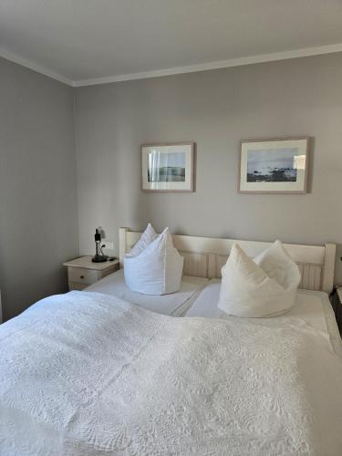 Una cama o camas en una habitación de Taun Hövt