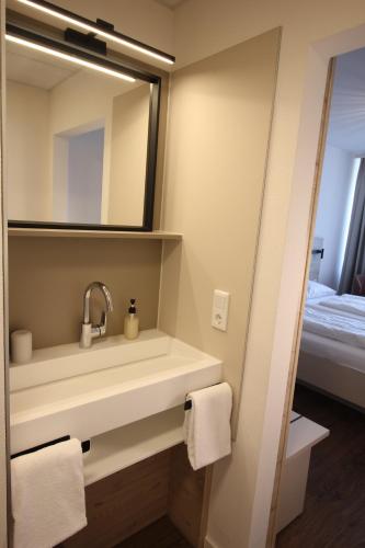 Postel nebo postele na pokoji v ubytování Das HOB - Hotel Original Bamberg