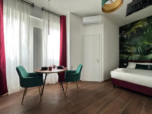 Postel nebo postele na pokoji v ubytování Maison Gucci