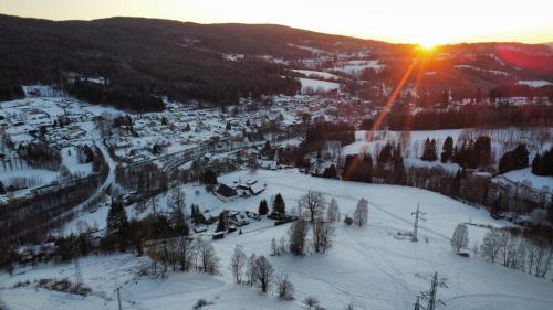 an aerial view of a ski resort in the snow at Brave Lama in Tanvald