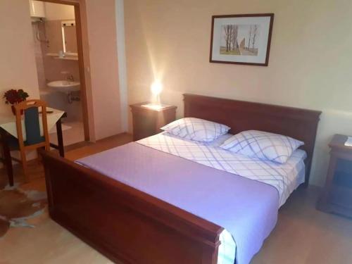 Ένα ή περισσότερα κρεβάτια σε δωμάτιο στο Wohnung Katarina Auf Der Insel Pag