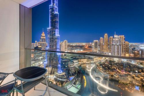 SML Vacation Homes - Sky High Apartments with Burj Khalifa and Dubai Fountain Views at Grande Signature, Downtown Dubai