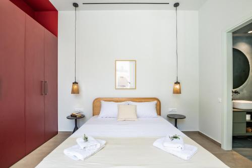 Ένα ή περισσότερα κρεβάτια σε δωμάτιο στο Marianna Suites