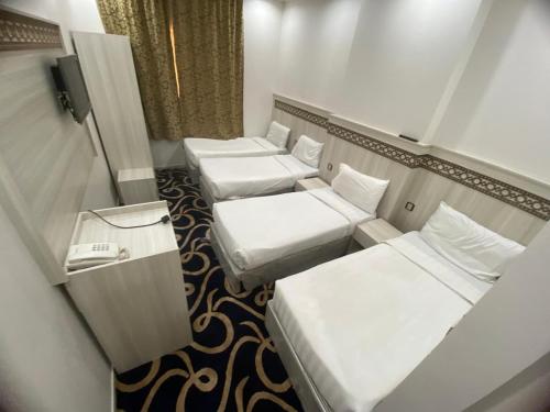 Koupelna v ubytování AKABER ELSHESHA awtadhotel2 اكابر الششة اوتاد هوتيل 2