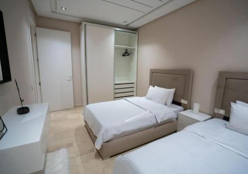 Postel nebo postele na pokoji v ubytování Appartement luxueux vue mer