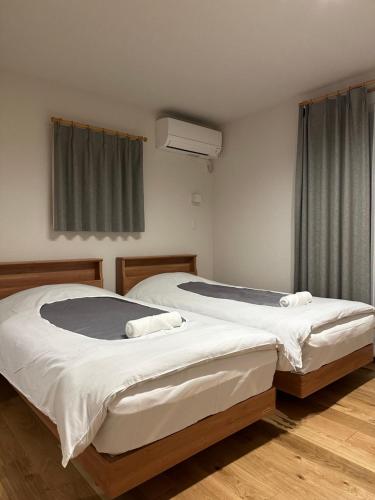 Ένα ή περισσότερα κρεβάτια σε δωμάτιο στο Snow fox chalet