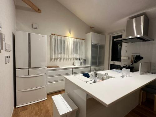 Η κουζίνα ή μικρή κουζίνα στο Snow fox chalet