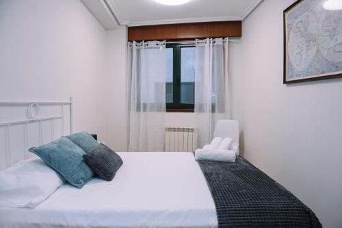 Postel nebo postele na pokoji v ubytování Céntrico y acogedor en Vigo by CABANA Rentals