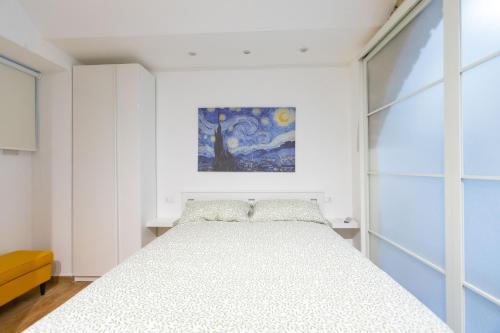 Cama o camas de una habitación en Troppo Forte appartamento a due passi dal Colosseo
