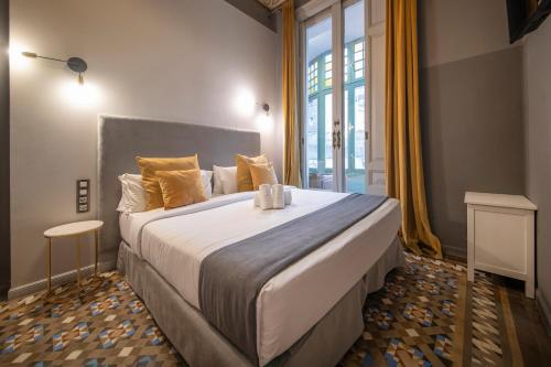 Postel nebo postele na pokoji v ubytování You Stylish City Center Apartments