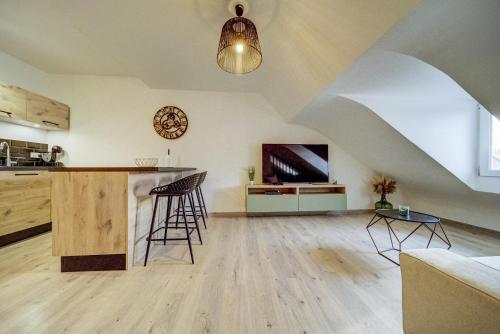 Η κουζίνα ή μικρή κουζίνα στο Appartement sous combles