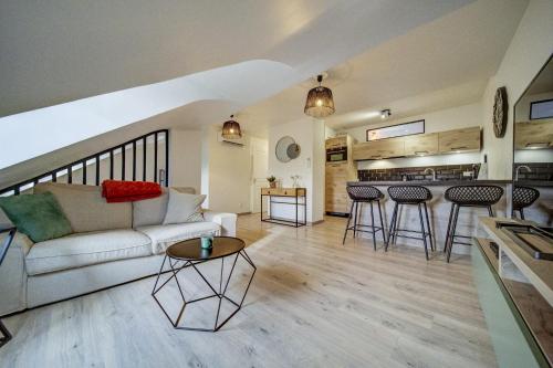 Η κουζίνα ή μικρή κουζίνα στο Appartement sous combles