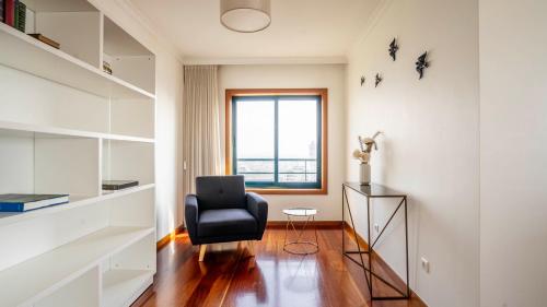 Zona de estar de Seaside 3BR Flat in Póvoa by LovelyStay