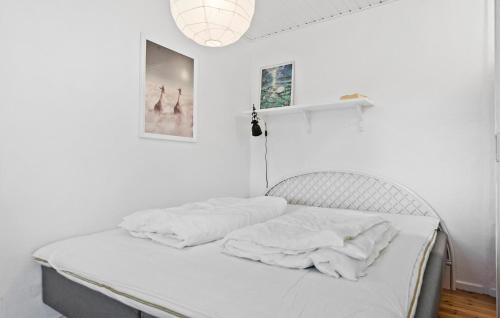 Ένα ή περισσότερα κρεβάτια σε δωμάτιο στο 3 Bedroom Awesome Home In Odder