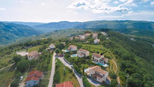an aerial view of a village in the mountains at Ferienhaus In Sovinjak Mit Grill, Garten Und Terrasse in Buzet