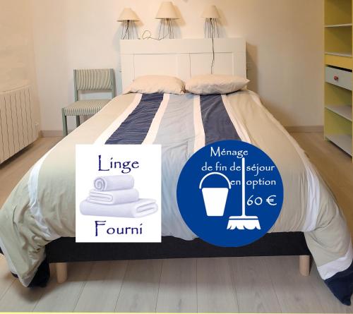 a bedroom with a king bed and a room with a floor at La Vigie perchée - Les Gîtes de la Côte d'Amour in Le Croisic