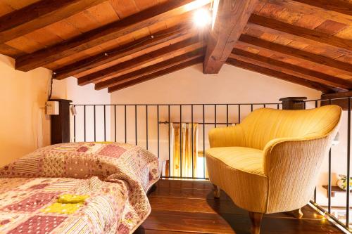 Ένα ή περισσότερα κρεβάτια σε δωμάτιο στο Borgo Dolci Colline Resort Limonaia